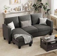 a gray sectional sofa in a living room